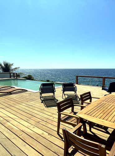 MOutdoor Pool Vacation Rental and Dining Area Roatan